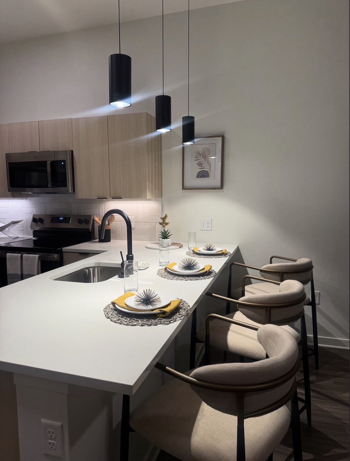 Spotless modern kitchen with a polished quartz island